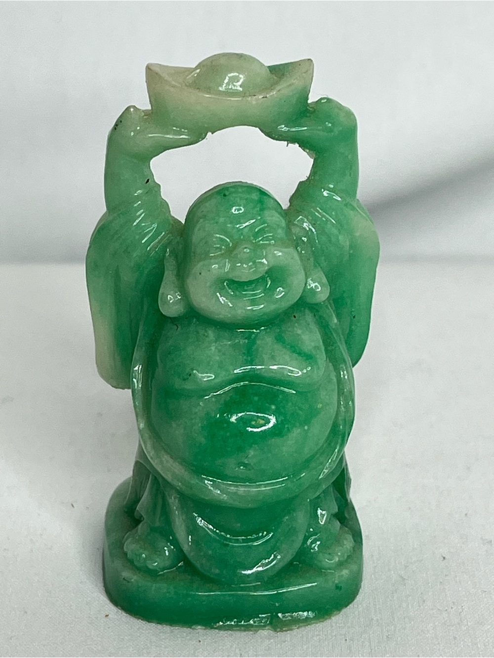 Green Faux Jade Resin Laughing Buddha Holding Ingot Overhead Statue. 2.5" Tall